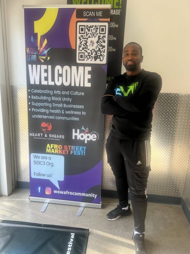 Retractable welcome banner for a community festival