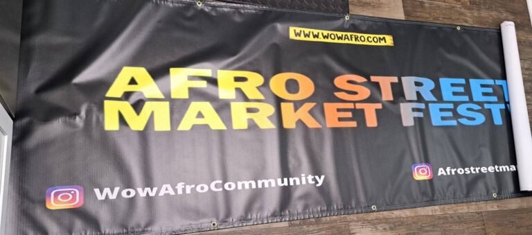 Full-color vinyl banner with grommets for a street market festival